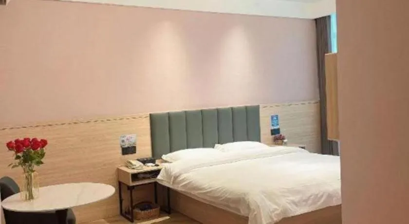 Bed in GreenTree Inn Suzhou Shengze Hotel