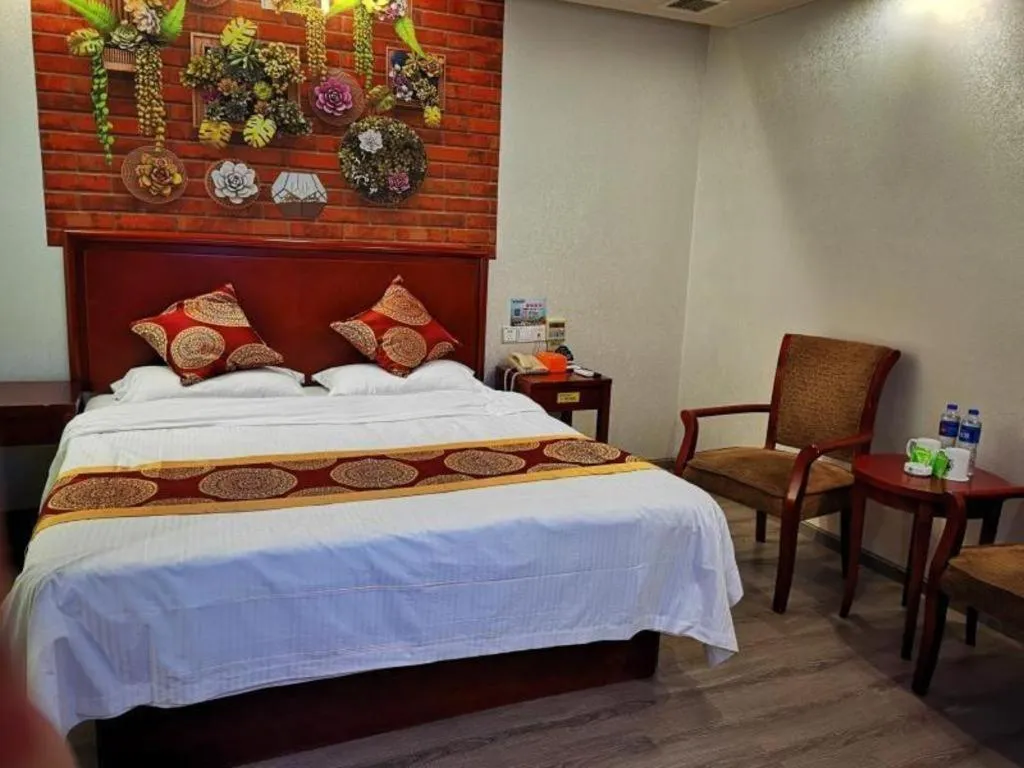 Bed in GreenTree Inn Suzhou Shengze Hotel