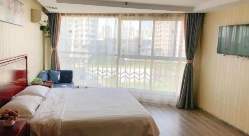 Bed in GreenTree Inn Suzhou Shengze Hotel