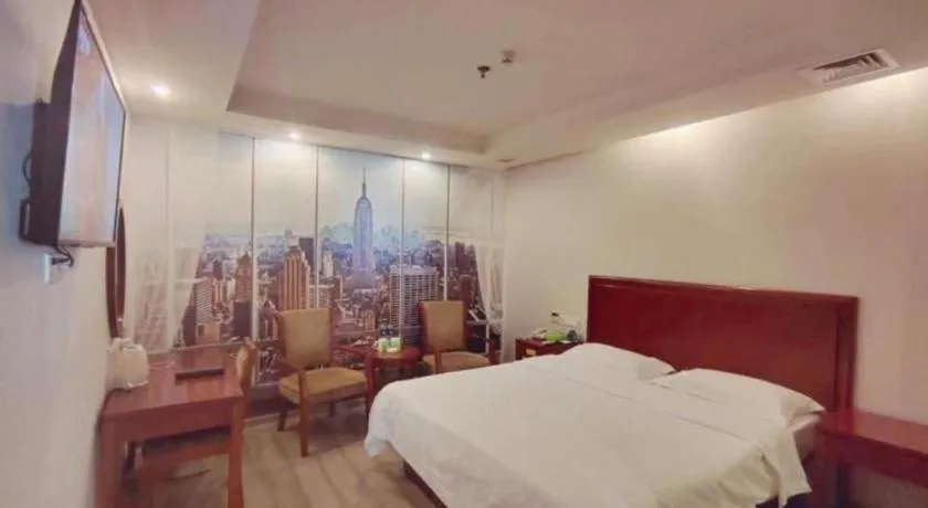 Bed in GreenTree Inn Suzhou Shengze Hotel