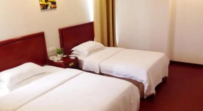 Bed in GreenTree Inn Suzhou Shengze Hotel