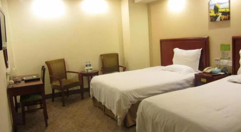 Bed in GreenTree Inn Suzhou Shengze Hotel