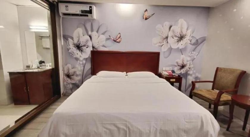 Bed in GreenTree Inn Suzhou Shengze Hotel