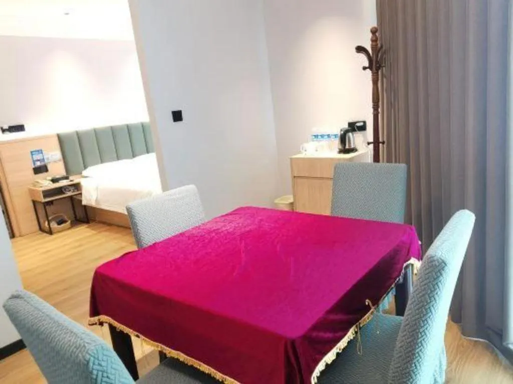 Bed in GreenTree Inn Suzhou Shengze Hotel