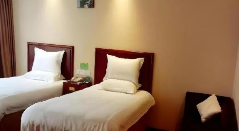Bed in GreenTree Inn Suzhou Shengze Hotel
