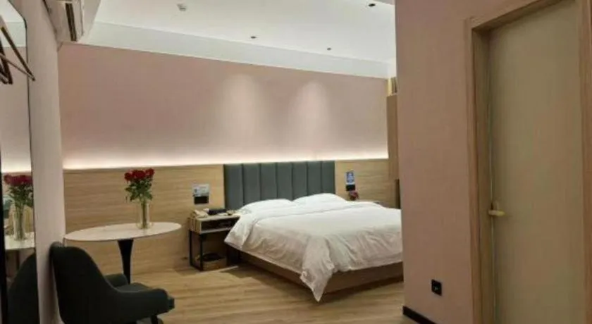 Bed in GreenTree Inn Suzhou Shengze Hotel