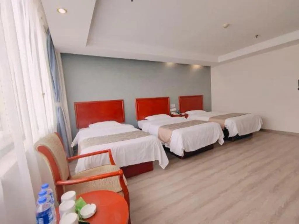 Bed in GreenTree Inn Suzhou Shengze Hotel