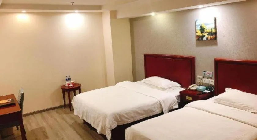 Bed in GreenTree Inn Suzhou Shengze Hotel