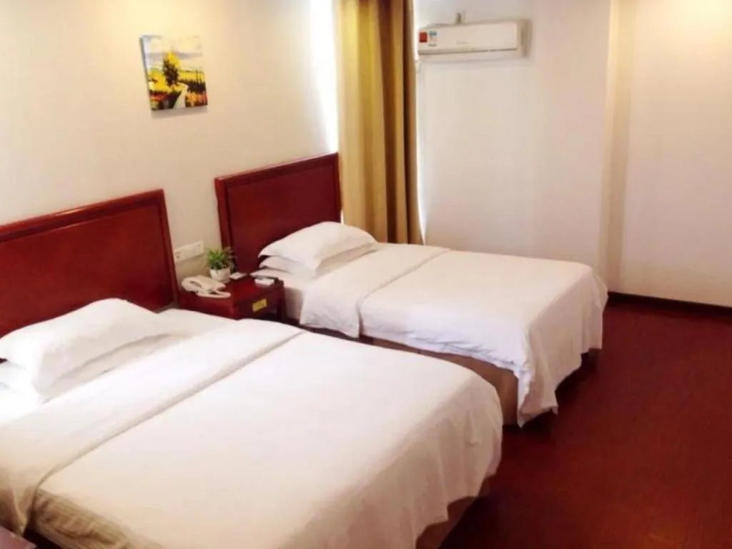 Bed in GreenTree Inn Suzhou Shengze Hotel