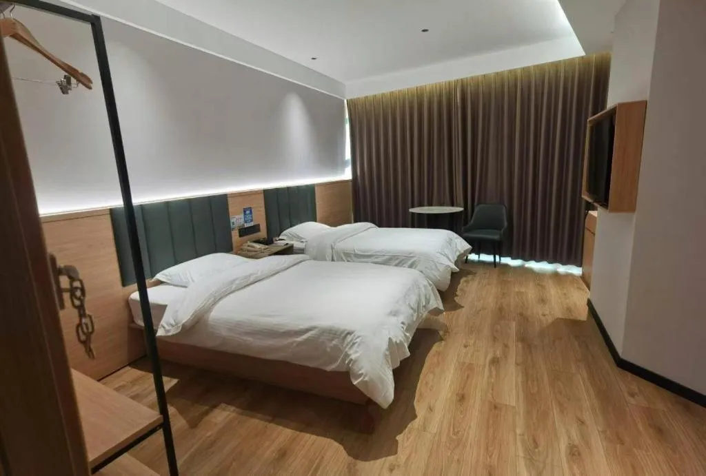 Bed in GreenTree Inn Suzhou Shengze Hotel