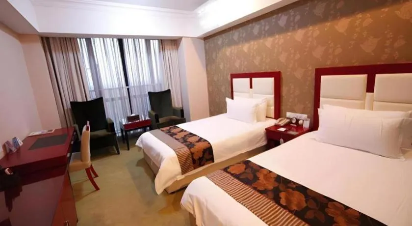 Bed in Ningbo ShouNan Hotel