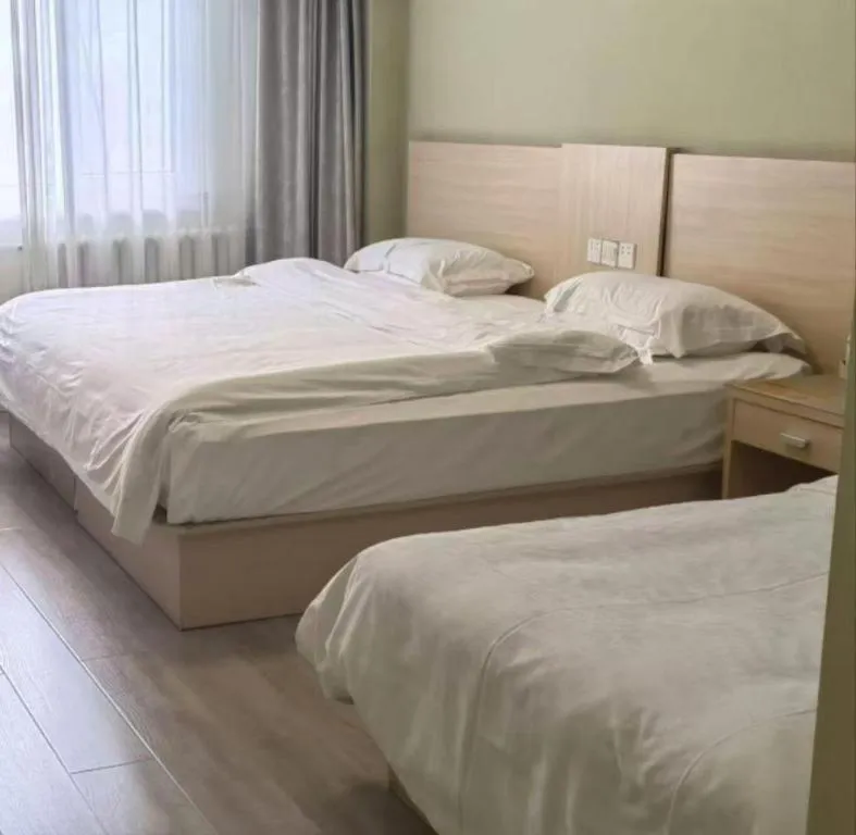 Bed in Super 8 Hotel Chengde Imperial Summer Resort