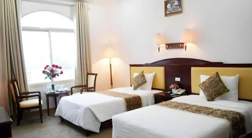 Bed in Cong Doan Viet Nam Hotel