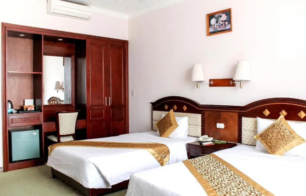 Bed in Cong Doan Viet Nam Hotel