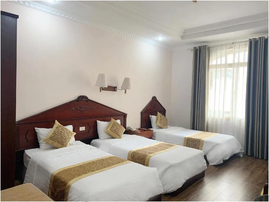 Bed in Cong Doan Viet Nam Hotel