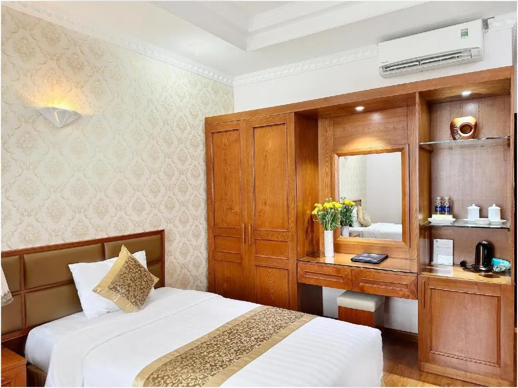 Bed in Cong Doan Viet Nam Hotel