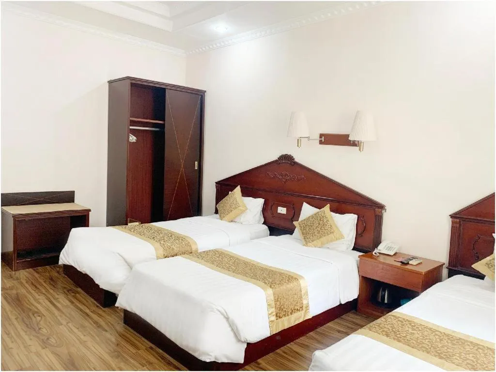 Bed in Cong Doan Viet Nam Hotel
