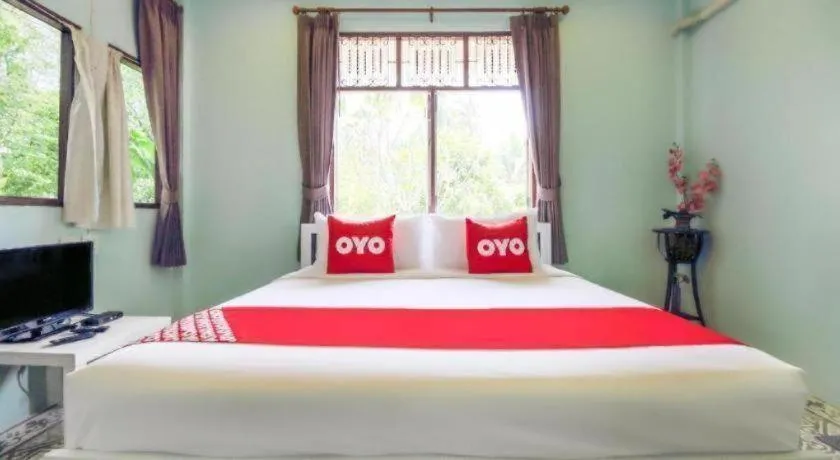 Bed in OYO 606 Baan Suansabai Pleanpanmai Resort Amphawa