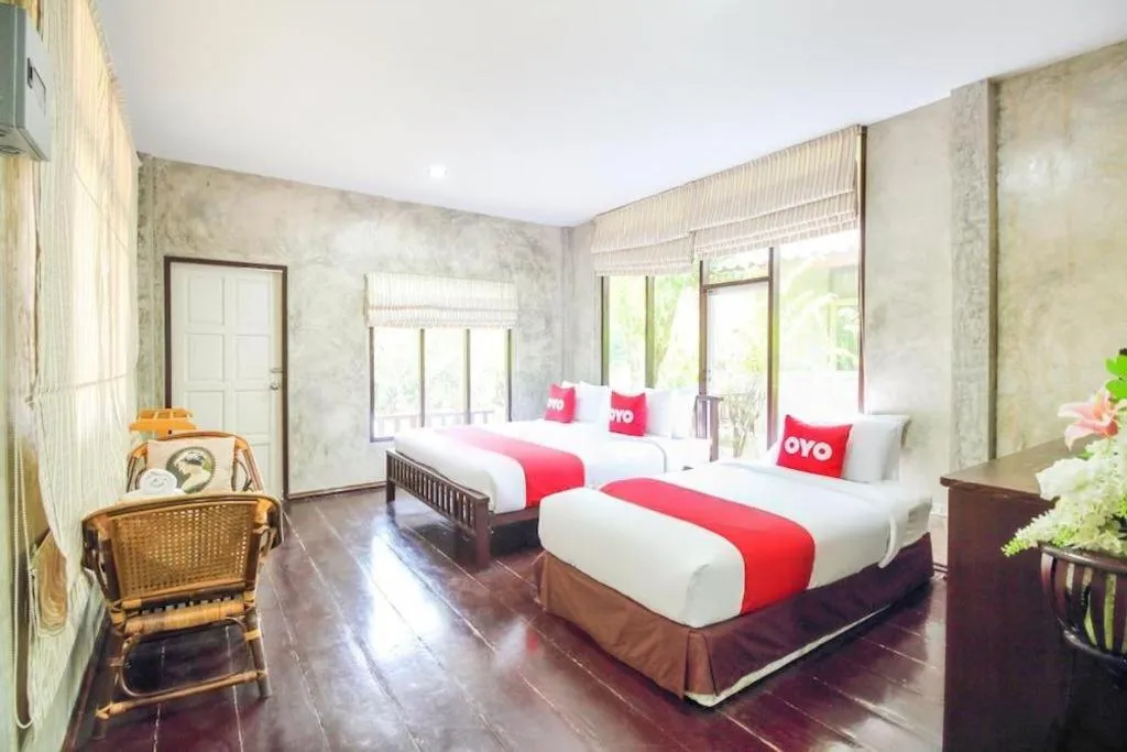 Bed in OYO 606 Baan Suansabai Pleanpanmai Resort Amphawa