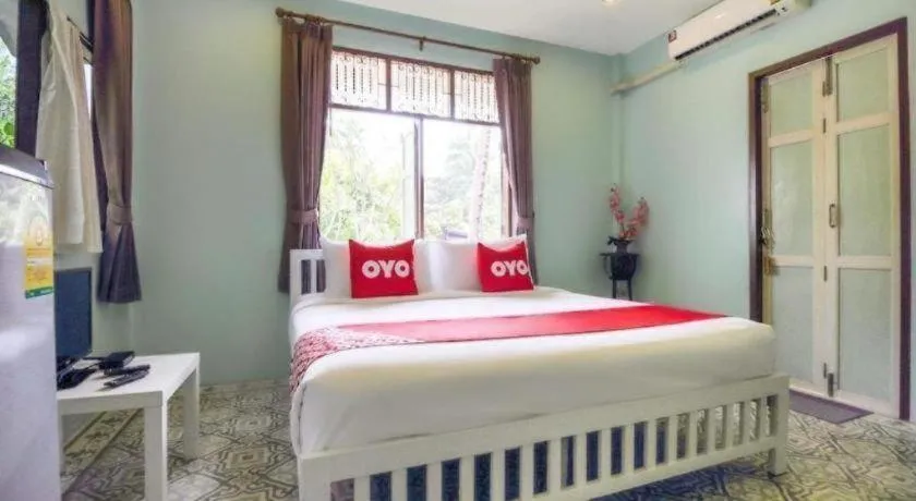 Bed in OYO 606 Baan Suansabai Pleanpanmai Resort Amphawa