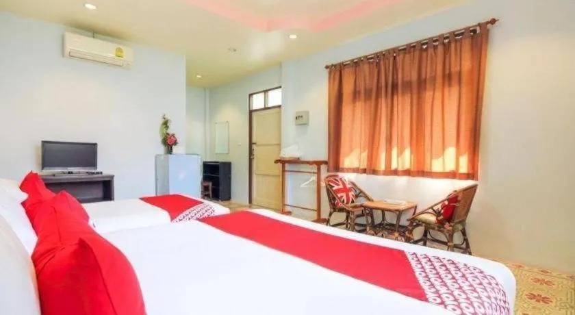 Bed in OYO 606 Baan Suansabai Pleanpanmai Resort Amphawa