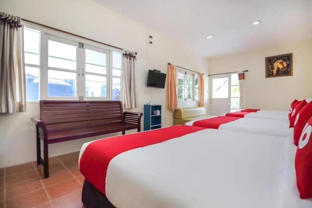 Bed in OYO 606 Baan Suansabai Pleanpanmai Resort Amphawa