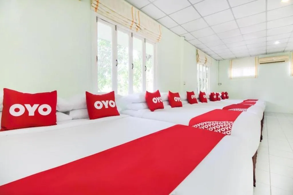 Bed in OYO 606 Baan Suansabai Pleanpanmai Resort Amphawa