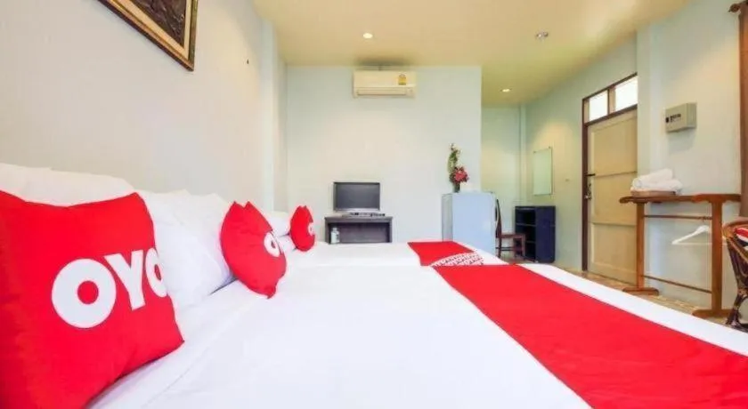 Bed in OYO 606 Baan Suansabai Pleanpanmai Resort Amphawa