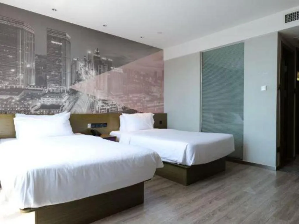 Bed in ibis Styles Wuhan Optics Valley Square Hotel