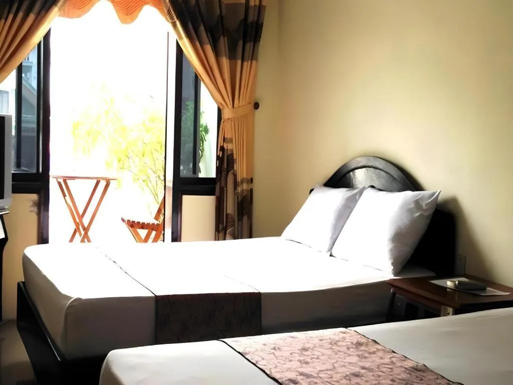 Bed in Dong Loi Hotel