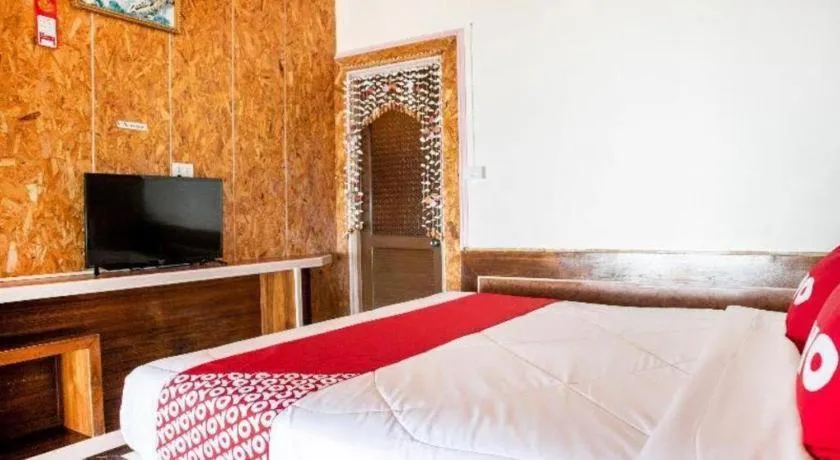 Bed in OYO 797 Pink House Bungalow