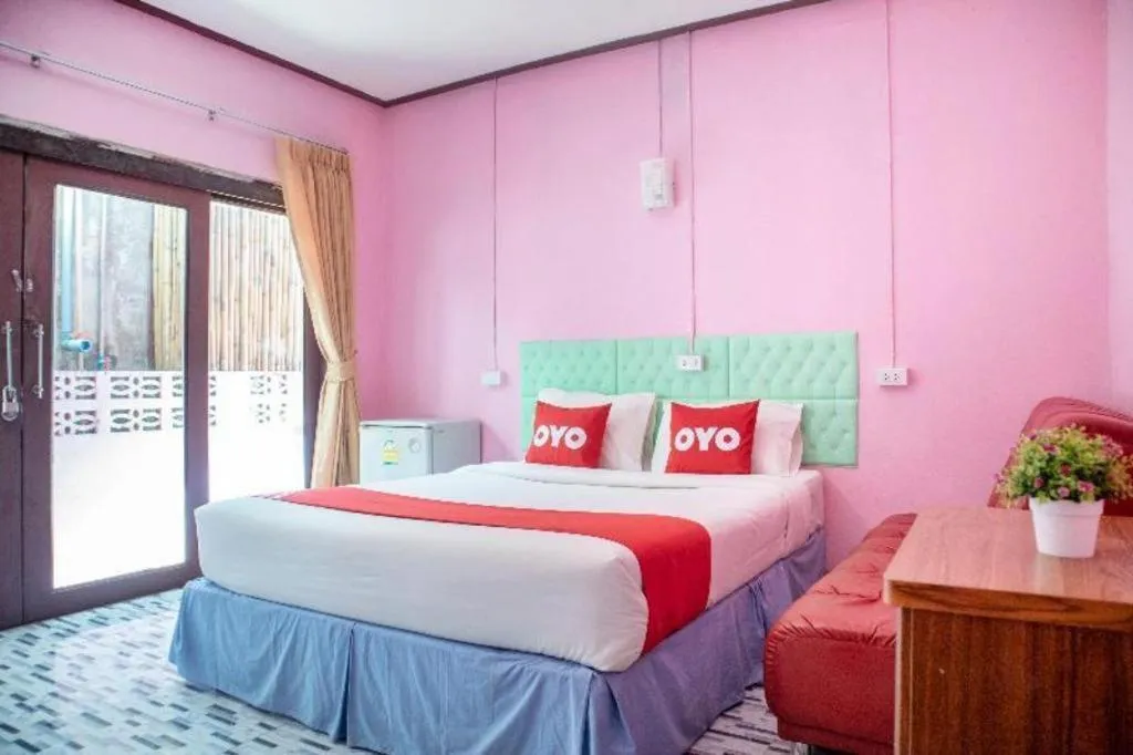 Bed in OYO 797 Pink House Bungalow