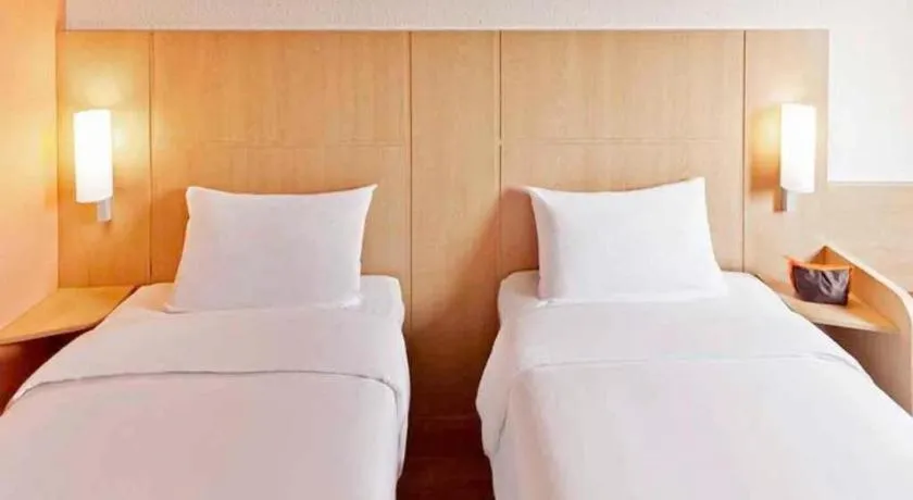 Bed in Ibis Shanghai Expo Dongming Road Metro Station