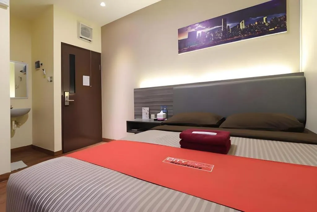 Bed in City Icon Residence