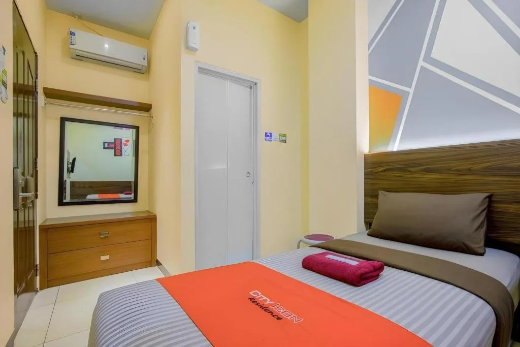 Bed in City Icon Residence