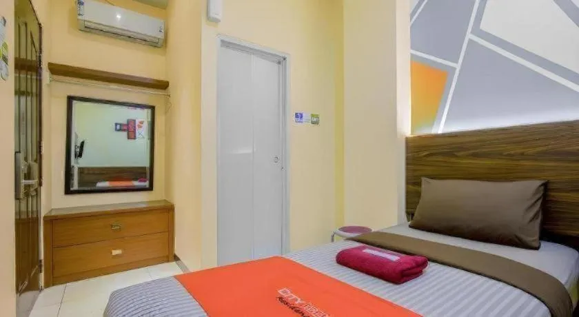 Bed in City Icon Residence