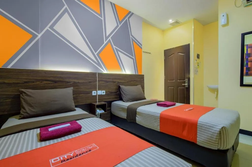 Bed in City Icon Residence