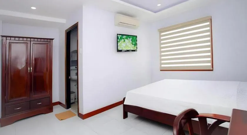 Bed in Nhatrang Cozy Hotel