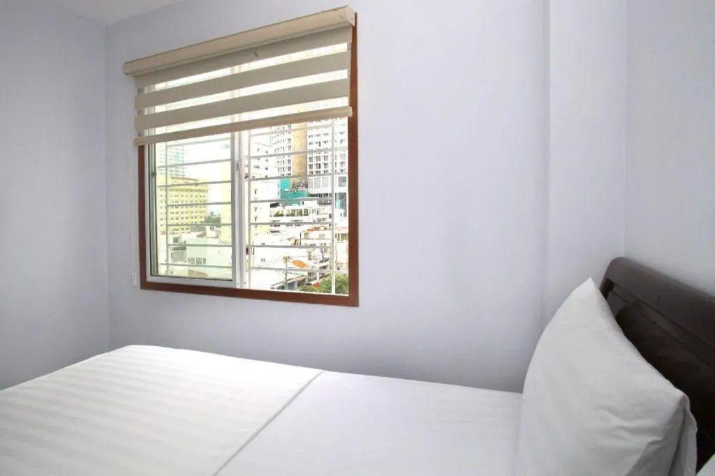 Bed in Nhatrang Cozy Hotel