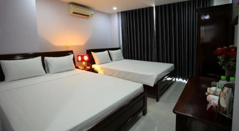 Bed in Nhatrang Cozy Hotel