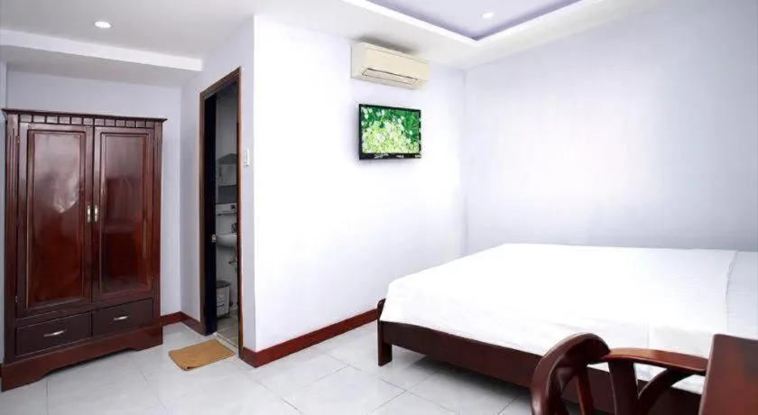 Bed in Nhatrang Cozy Hotel