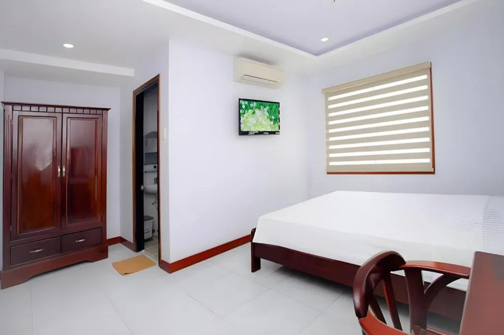 Bed in Nhatrang Cozy Hotel