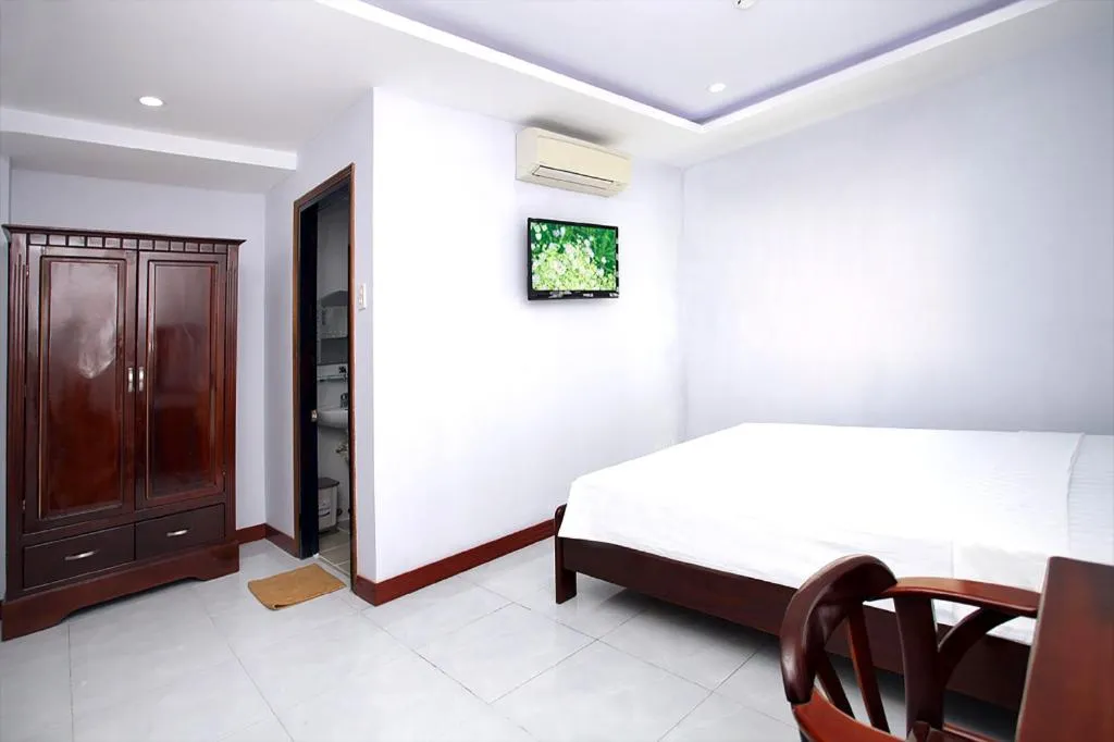 Bed in Nhatrang Cozy Hotel