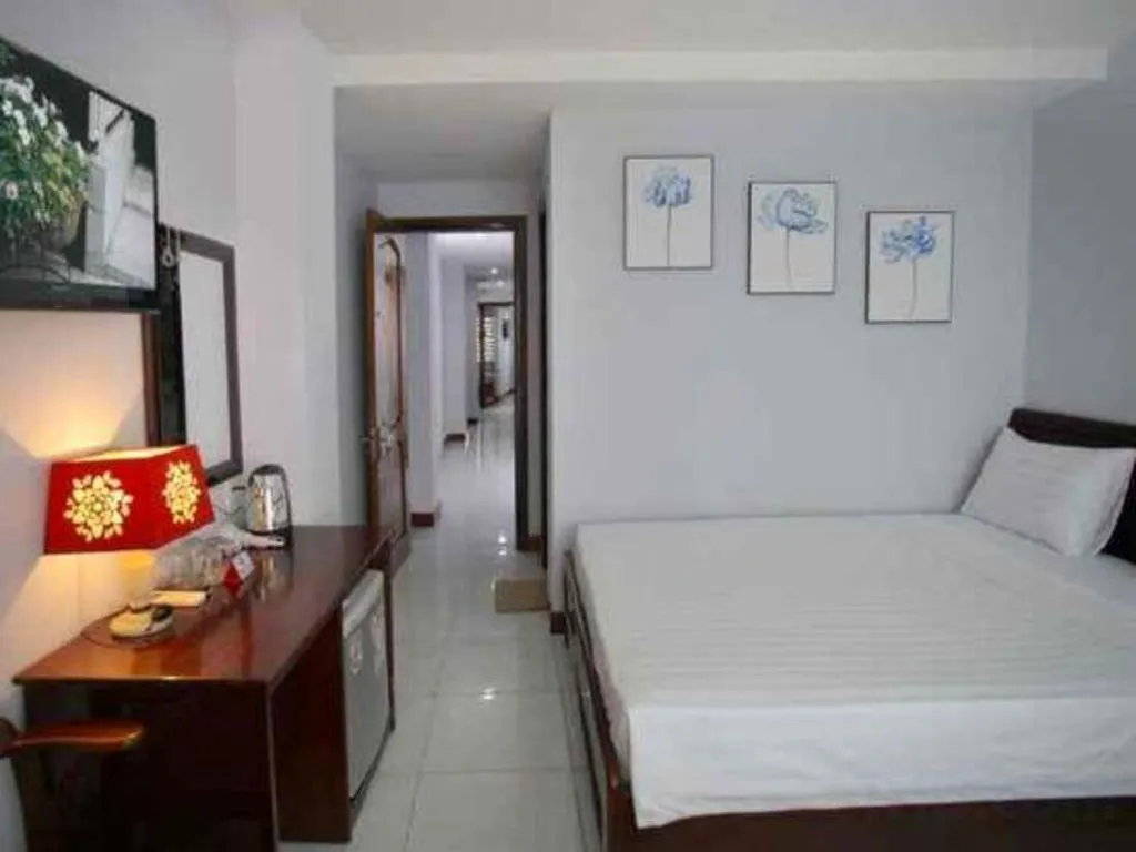 Bed in Nhatrang Cozy Hotel