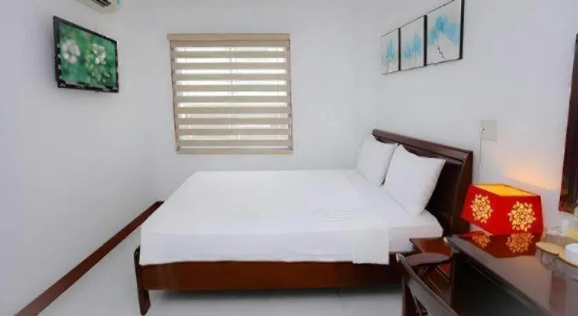 Bed in Nhatrang Cozy Hotel