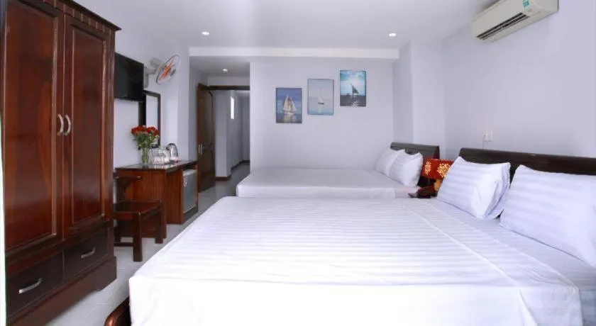 Bed in Nhatrang Cozy Hotel