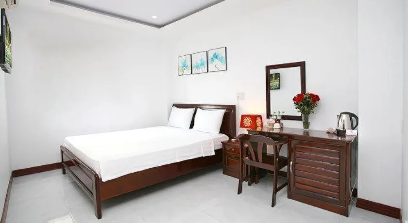 Bed in Nhatrang Cozy Hotel