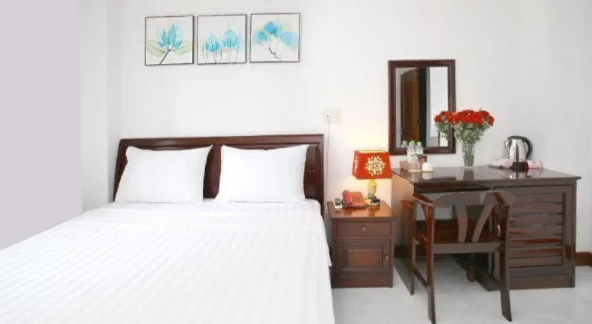 Bed in Nhatrang Cozy Hotel