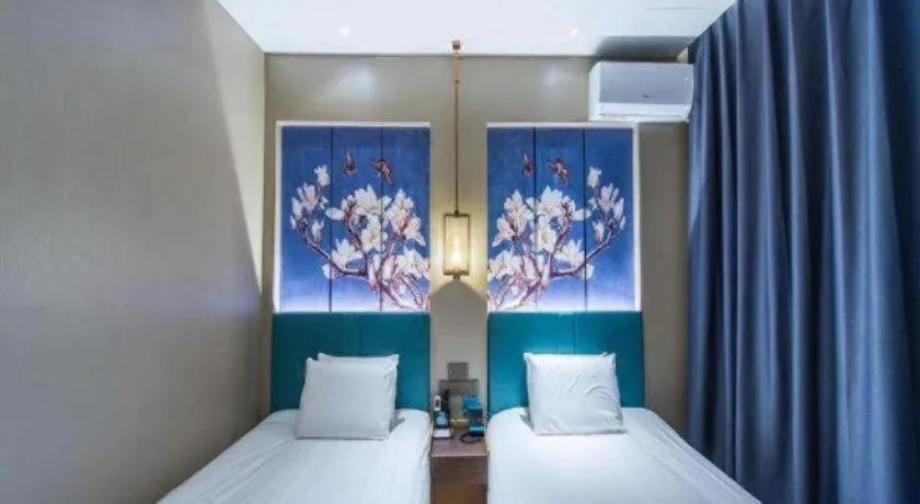 Bed in Jinjiang Inn Jinan Shimao Kuanhouli Quancheng Road