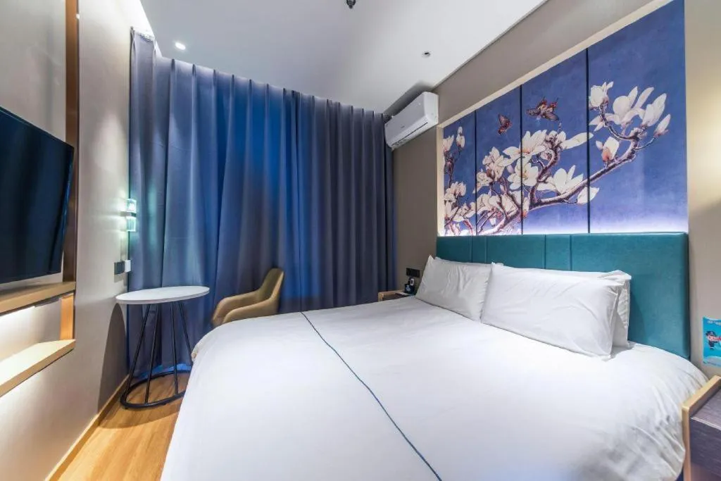 Bed in Jinjiang Inn Jinan Shimao Kuanhouli Quancheng Road